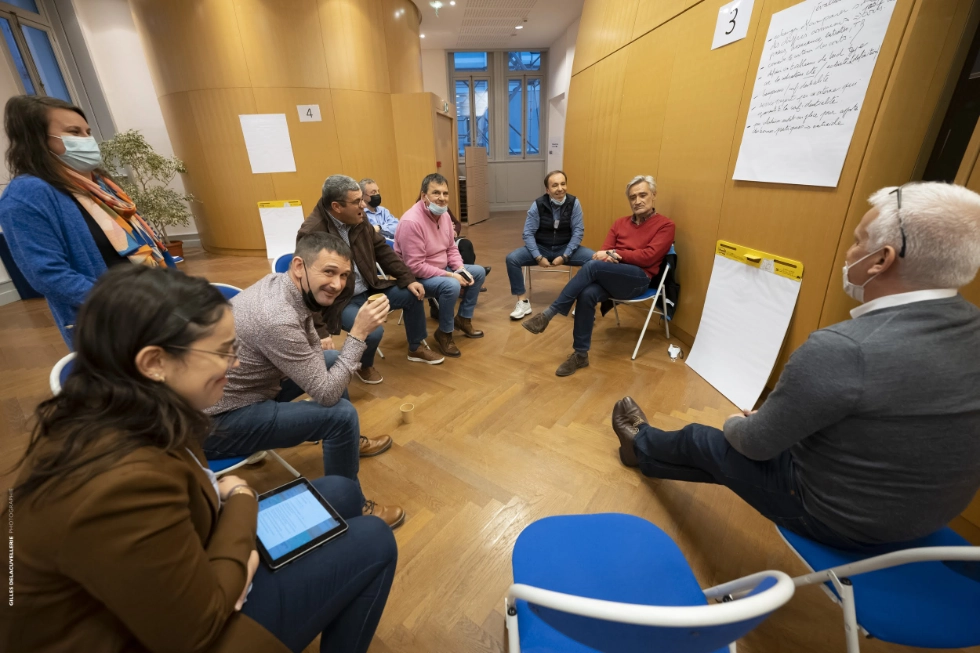 A group from an open space, most tools are low-tech but insights are captured with Stormz.